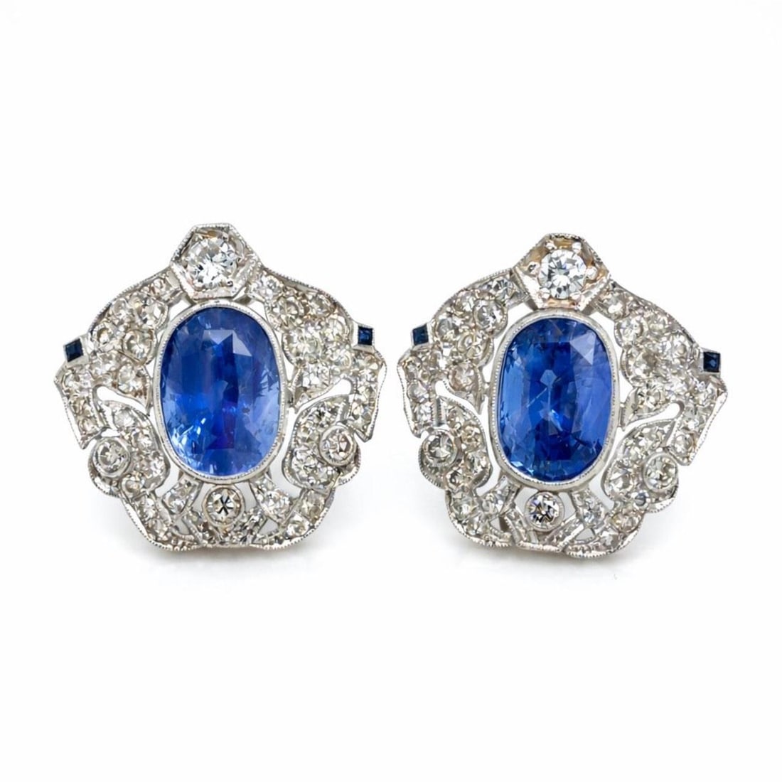 GIA Certified Ceylon Sapphire and Diamond Earrings in 18K 14K White Gold: GIA Certified Ceylon Sapphire and Diamond Earrings in 18K 14K White Gold These earrings are crafted from a combination of 18K and 14K white gold and feature two GIA certified Ceylon sapphires with a t