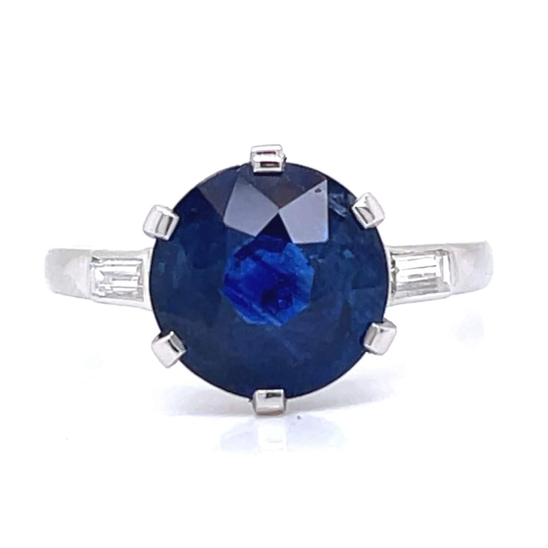 Art Deco Platinum GIA Certified 3.77 Ct Ceylon Sapphire Diamond Ring: Art Deco Platinum GIA Certified 3.77 Ct Ceylon Sapphire Diamond Ring This stunning Art Deco ring features a GIA Certified 3.77 Ct. heated Ceylon Sapphire, complemented by two elegant baguette diamonds