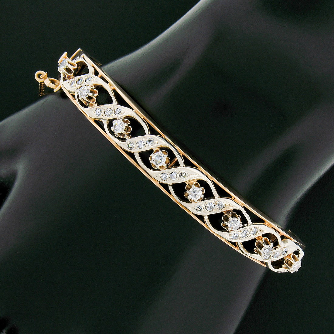 Vintage Two Tone Gold Diamond Infinity Hinged Bangle Bracelet 0.70ctw: Vintage Two Tone Gold Diamond Infinity Hinged Bangle Bracelet 0.70ctw This exquisite Vintage Two Tone Gold Round Diamond Infinity Open Work Hinged Bangle Bracelet showcases a stunning design crafted f