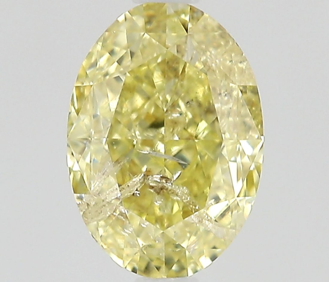 Loose Diamond - OVAL 0.7ct Fancy Light Yellow I2: Loose Diamond - OVAL 0.7ct Fancy Light Yellow I2 Source: Natural Shape: OVAL Carats: 0.7 Color: Fancy Light Yellow Certification: NONE Video: