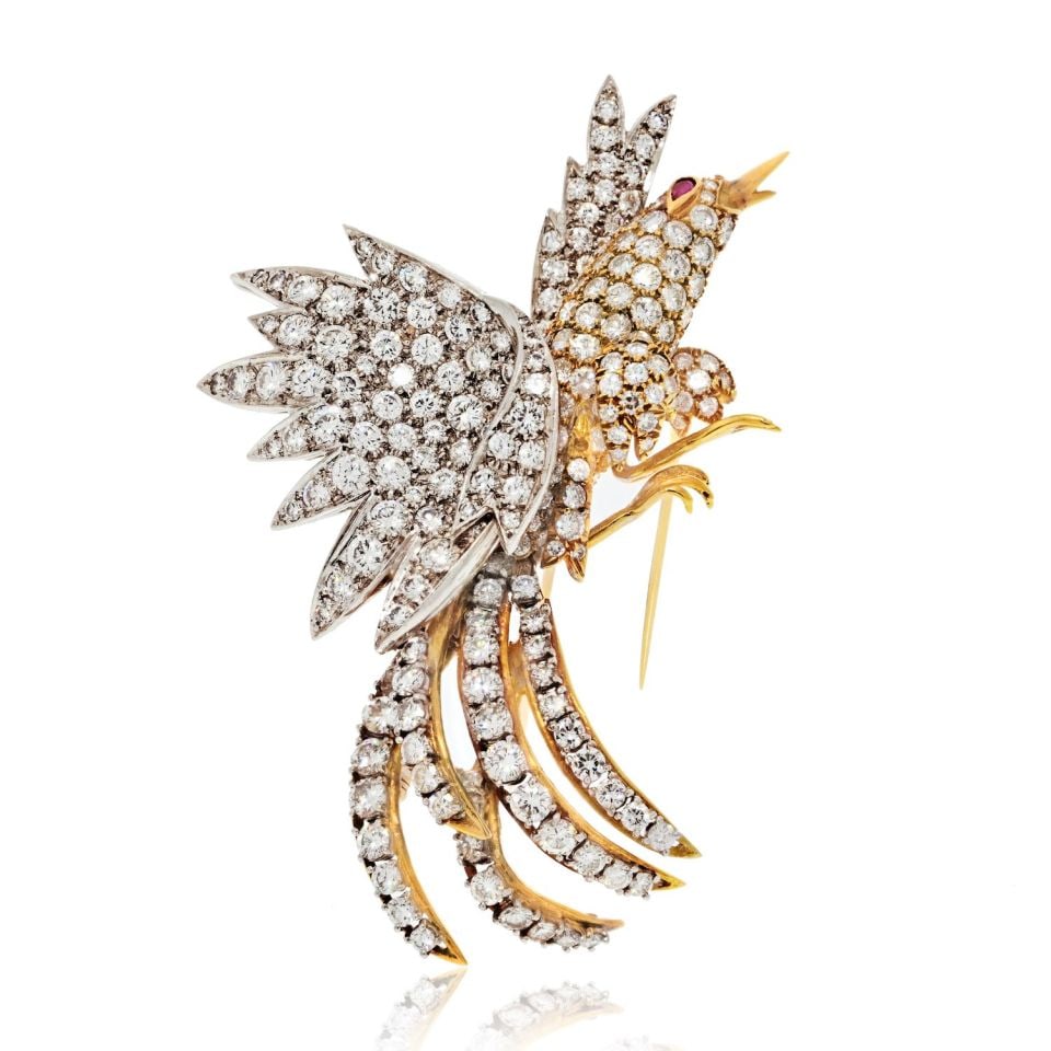 Exquisite 20 Carat Diamond Bird Brooch in Platinum and 18K Yellow Gold: Exquisite 20 Carat Diamond Bird Brooch in Platinum and 18K Yellow Gold This exquisite estate diamond bird brooch is a stunning representation of grace and elegance. Crafted from a combination of plati
