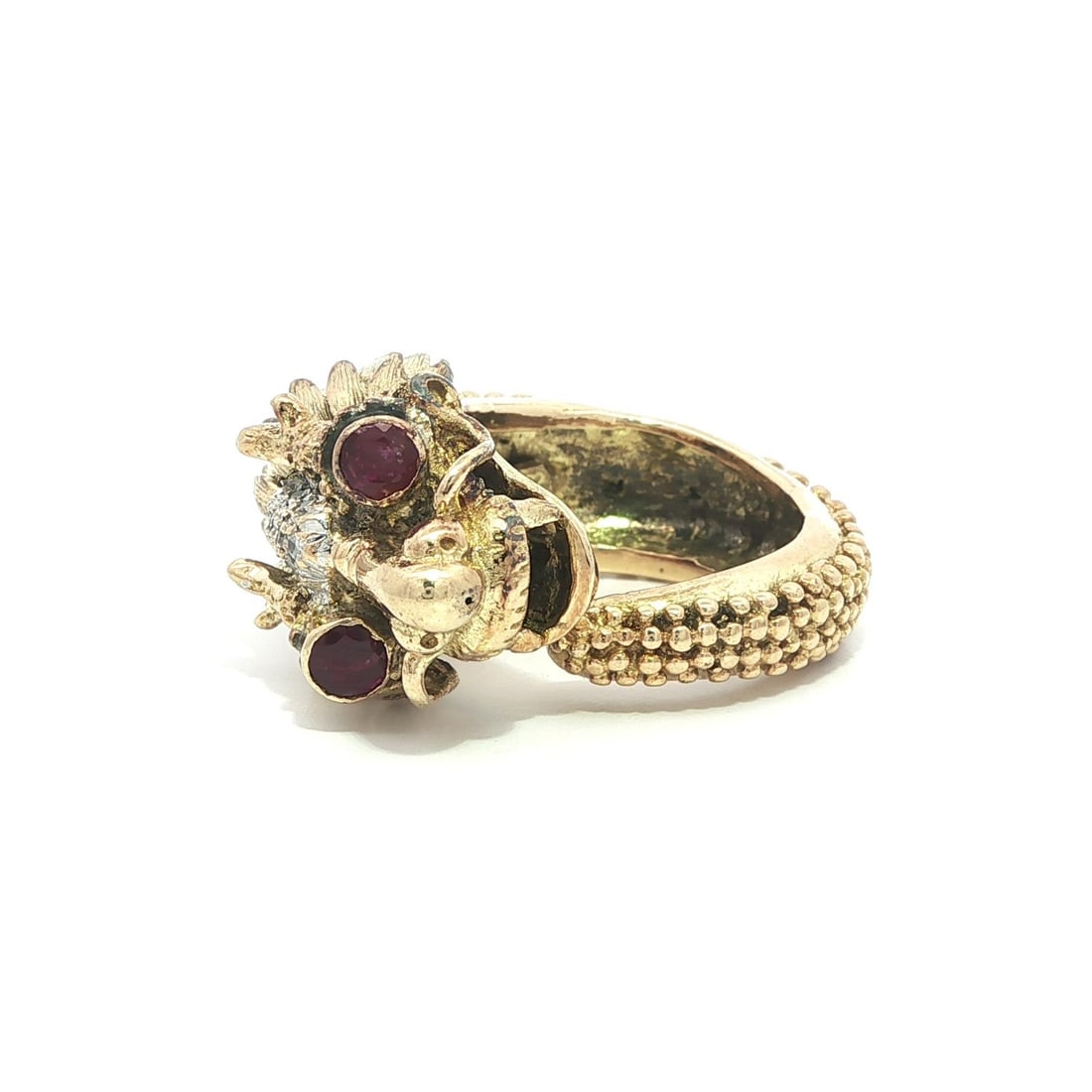Textured Dragon Serpent Wrap Band with Diamonds and Rubies in 14k Yellow Gold: Textured Dragon Serpent Wrap Band with Diamonds and Rubies in 14k Yellow Gold This vintage wrap band ring features a dragon serpent design crafted in solid 14k yellow gold. The ring is adorned with te