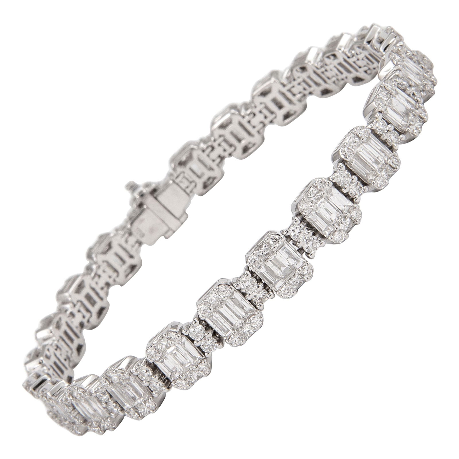7.93ct Diamond Illusion Bracelet 18k White Gold: 7.93ct Diamond Illusion Bracelet 18k White Gold This stunning 7.93ct Diamond Illusion Set Bracelet is crafted from luxurious 18k white gold and features an exquisite arrangement of diamonds that emula