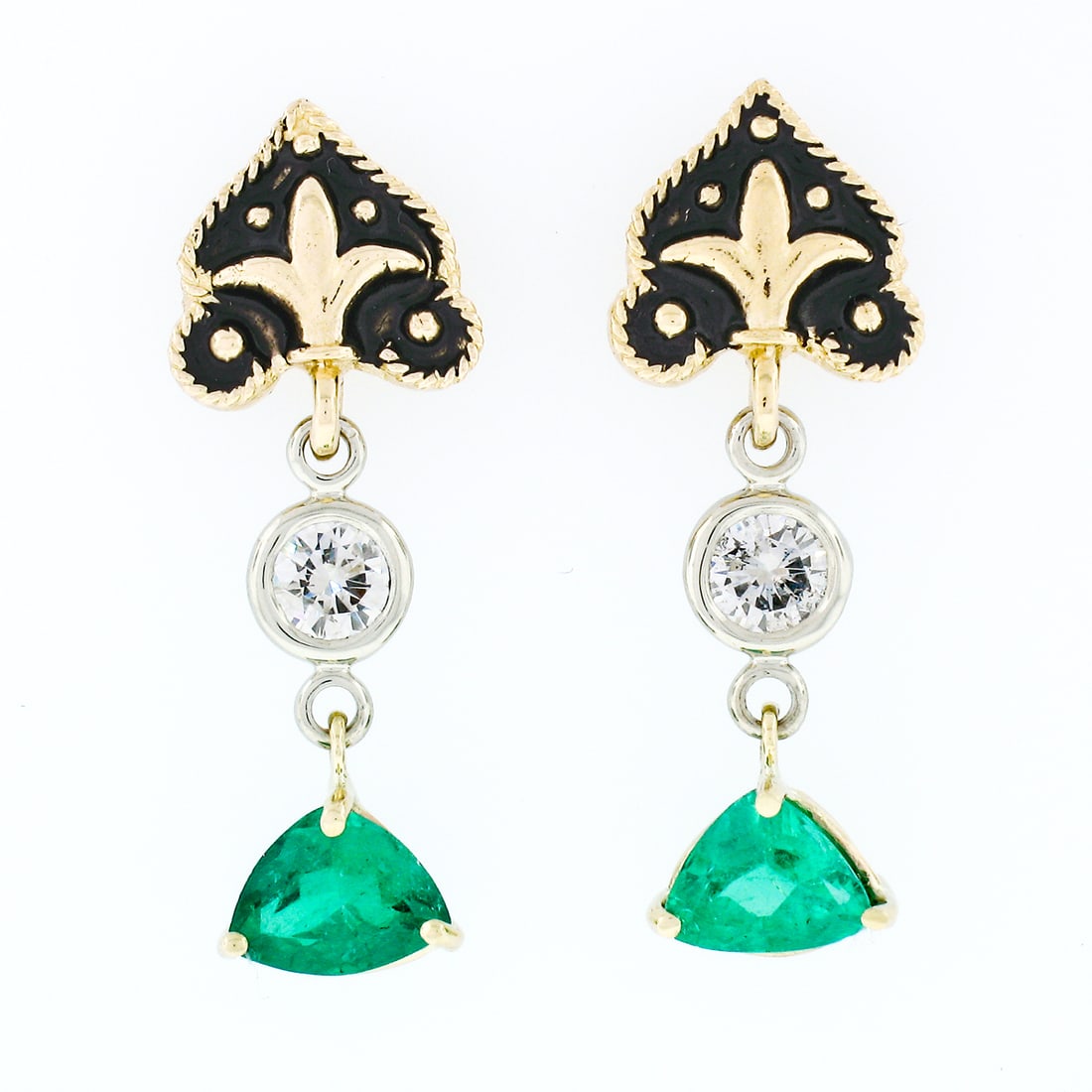 Vintage 14k Gold 1.28ctw Emerald Diamond Fleur De Lis Earrings: Vintage 14k Gold 1.28ctw Emerald Diamond Fleur De Lis Earrings These exquisite vintage earrings showcase a stunning combination of 14k multi-tone gold, featuring a distinctive fleur de lis design ador
