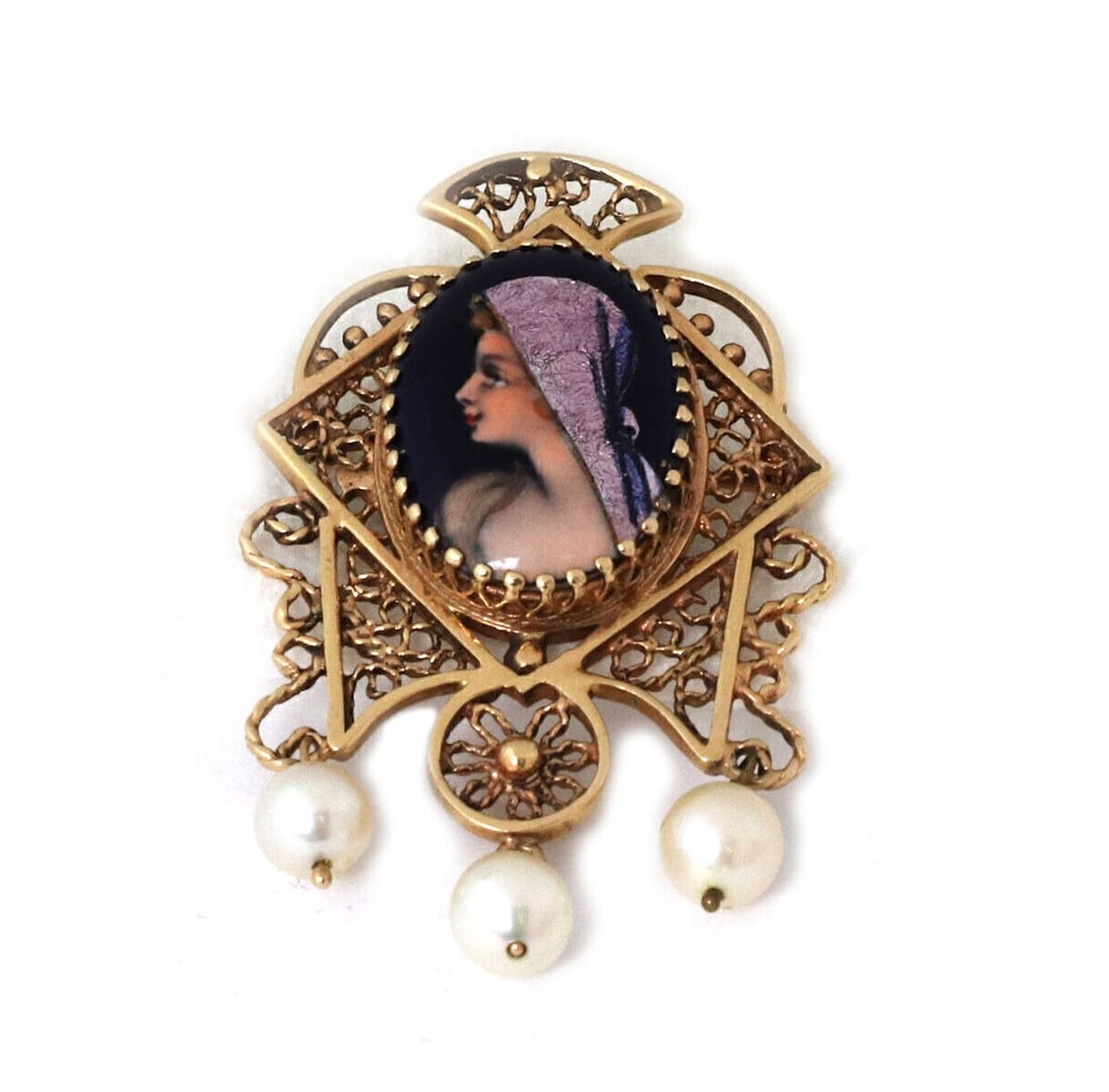 Vintage 14k Gold Enamel Cameo Brooch Pendant With Pearl Filigree Design: Vintage 14k Gold Enamel Cameo Brooch Pendant With Pearl Filigree Design This vintage brooch and pendant features a finely enamel painted cameo set in 14k yellow gold with intricate filigree detailing