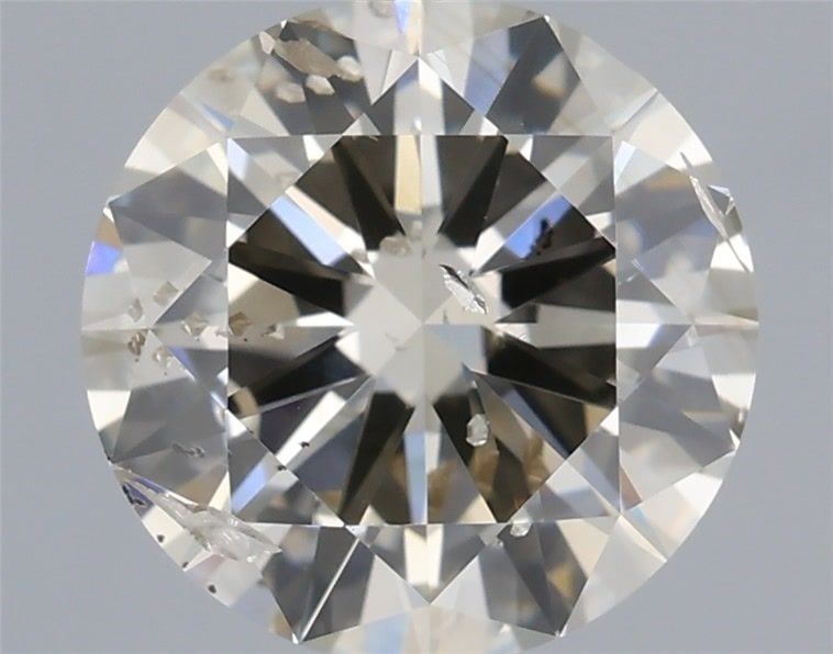 Loose Diamond - ROUND 0.9ct Very Light Brown SI2: Loose Diamond - ROUND 0.9ct Very Light Brown SI2 Source: Natural Shape: ROUND Carats: 0.9 Color: Very Light Brown Certification: IGI Video: