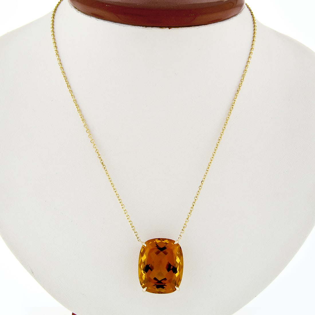 14k Gold 27.5ct Orange Citrine Cushion Cut Pendant Necklace: 14k Gold 27.5ct Orange Citrine Cushion Cut Pendant Necklace This exquisite pendant necklace features a stunning cushion cut natural citrine gemstone, weighing approximately 27.50 carats. Set in solid