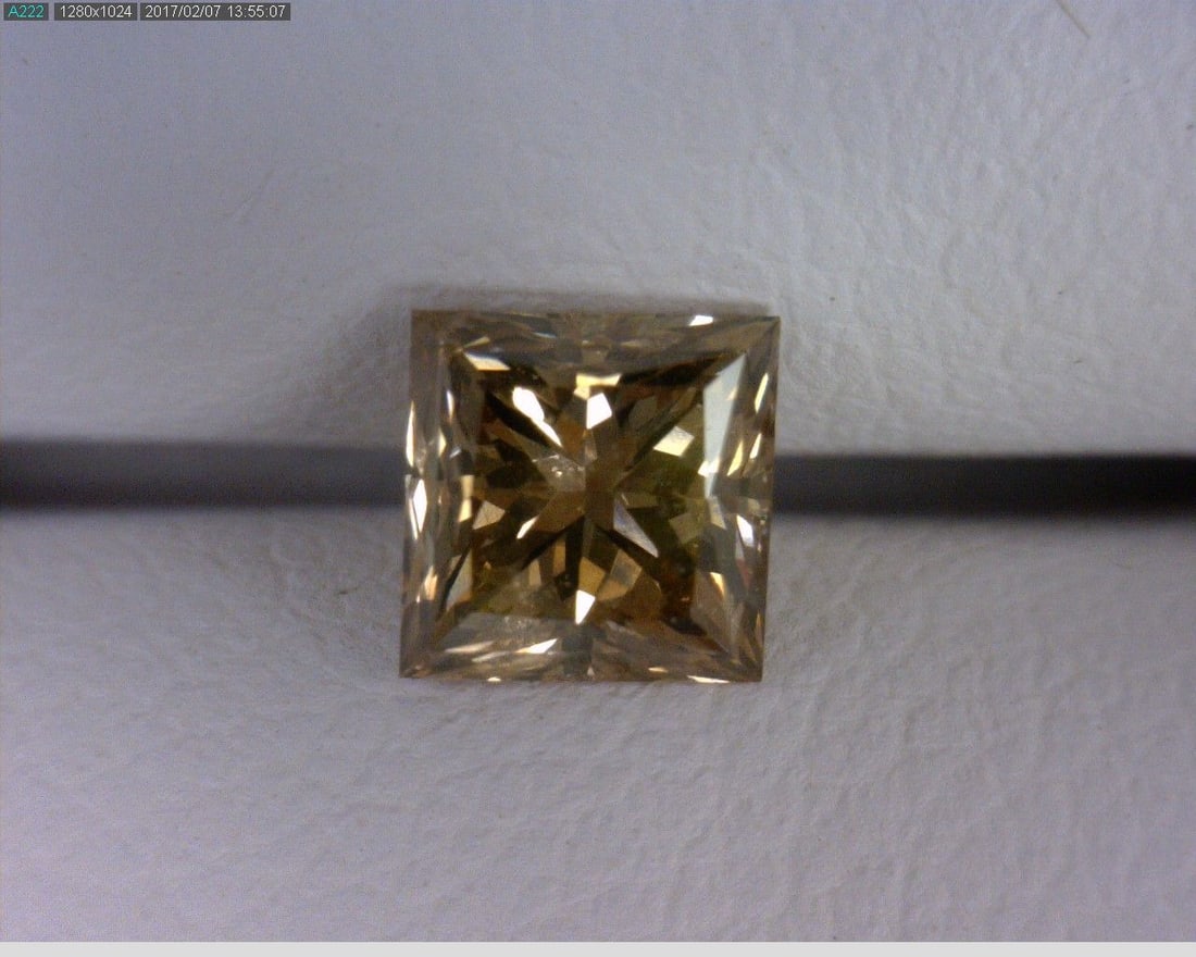 Loose Diamond - PRINCESS 0.54ct Brown SI1: Loose Diamond - PRINCESS 0.54ct Brown SI1 Source: Natural Shape: PRINCESS Carats: 0.54 Color: Brown Certification: OTHER The Diamond Depot Guarantee: All items in this auction are guaranteed to be 100