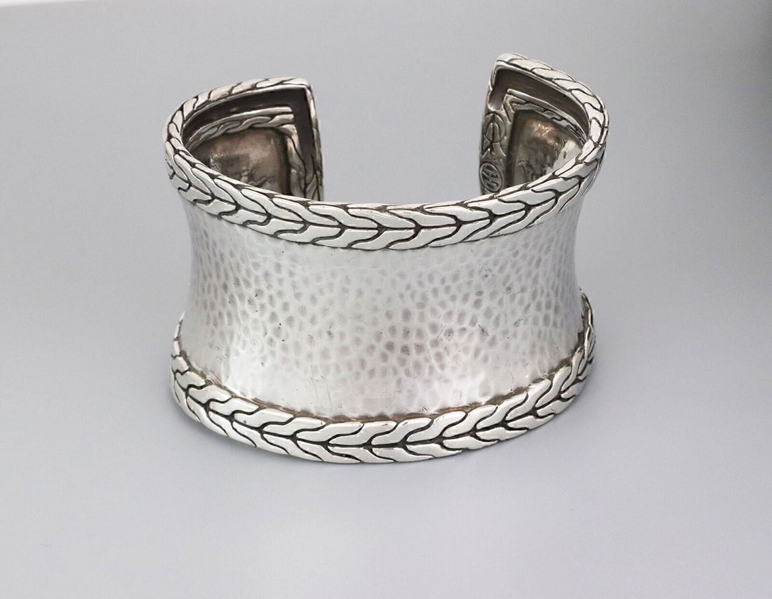 Sterling Silver Wide Cuff Bracelet from John Hardy Palu Collection: Sterling Silver Wide Cuff Bracelet from John Hardy Palu Collection This John Hardy Palu hammered wide cuff bracelet is crafted from solid sterling silver and features the signature Palu hammered finis
