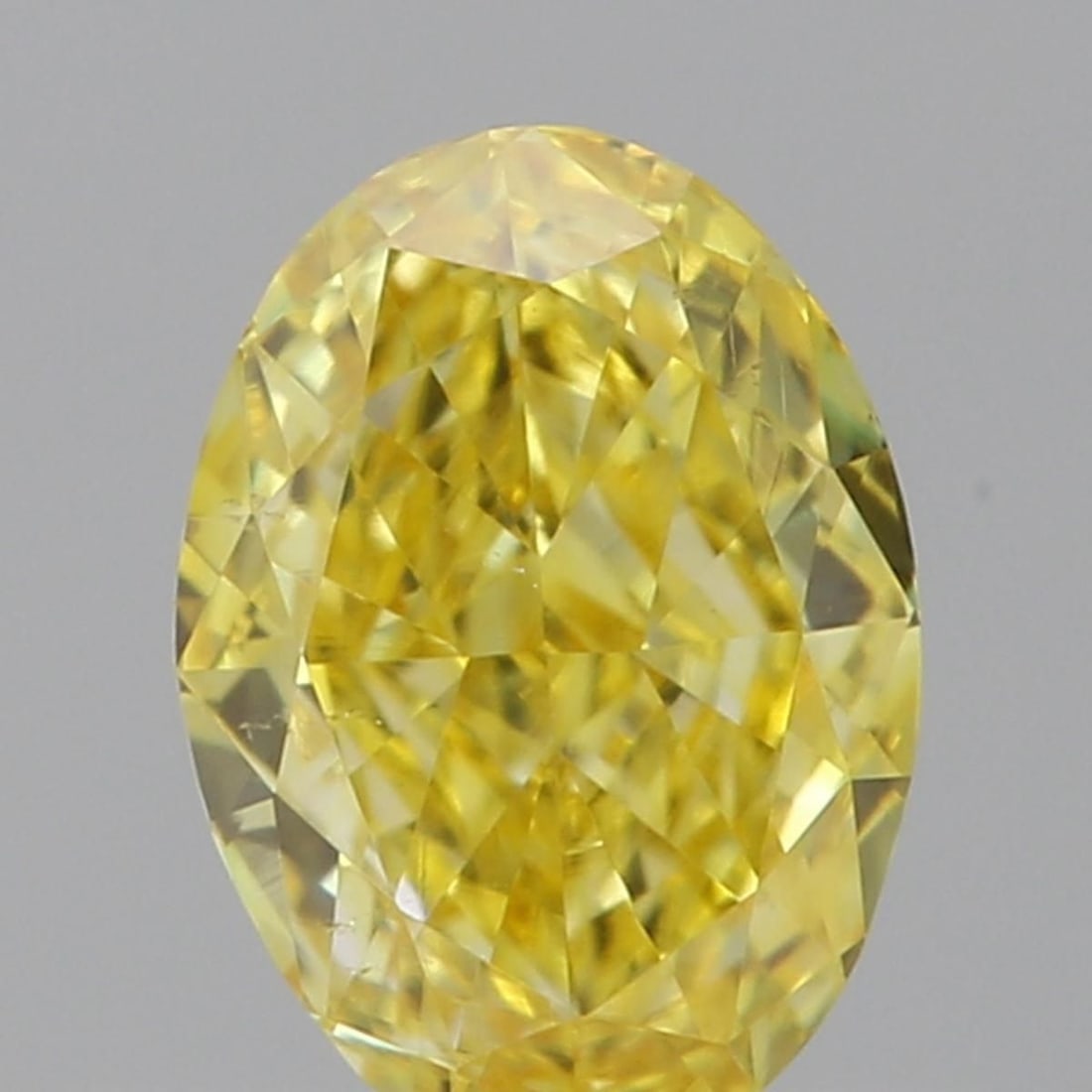 Loose Diamond - OVAL 0.31ct Fancy Vivid Yellow SI1: Loose Diamond - OVAL 0.31ct Fancy Vivid Yellow SI1 Source: Natural Shape: OVAL Carats: 0.31 Color: Fancy Vivid Yellow Certification: GIA Video: