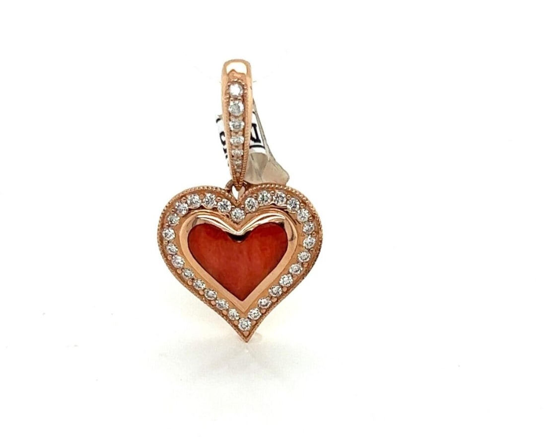 Heart Pendant in 14k Rose Gold with Diamond and Red Spiny Oyster by Kabana: Heart Pendant in 14k Rose Gold with Diamond and Red Spiny Oyster by Kabana This Kabana heart charm pendant is crafted in 14k rose gold and features a vibrant red spiny oyster inlay accented by approxi