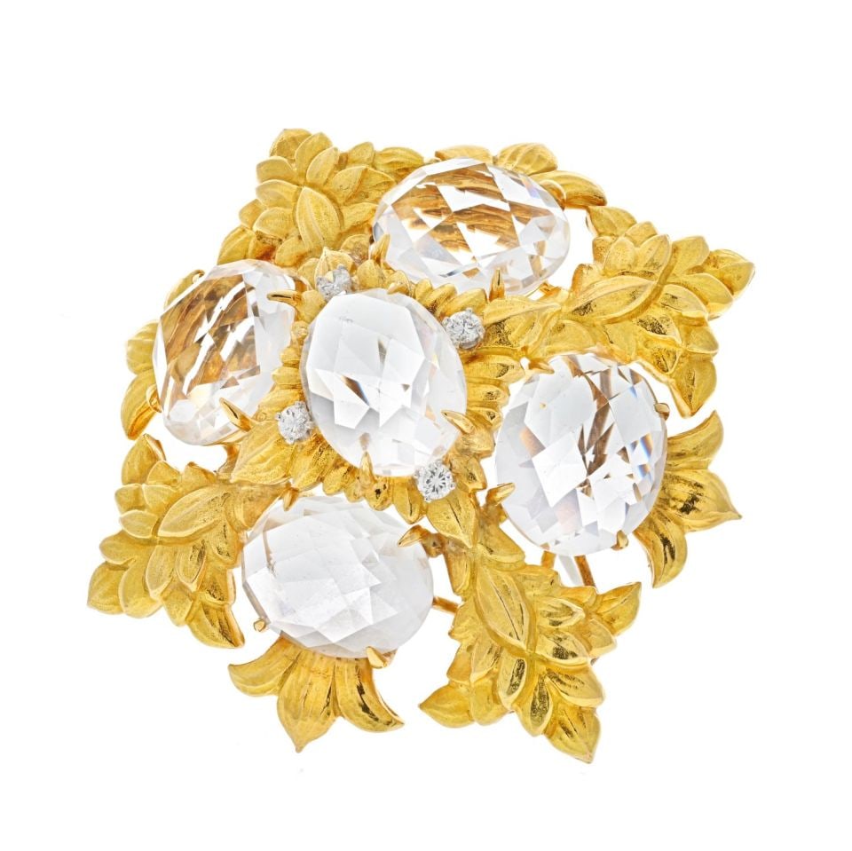 David Webb Platinum 18K Yellow Gold Rock Crystal Brooch Pendant: David Webb Platinum 18K Yellow Gold Rock Crystal Brooch Pendant This exquisite David Webb brooch showcases a stunning checkerboard cut rock crystal, elegantly set in a combination of platinum and 18K