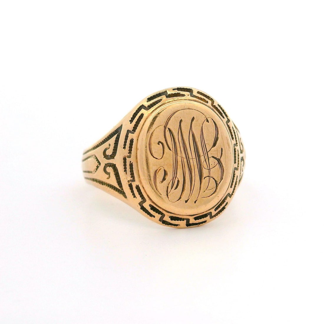 Vintage Ostby Barton 10k Rosy Yellow Gold Greek Key Signet Ring: Vintage Ostby Barton 10k Rosy Yellow Gold Greek Key Signet Ring This stunning vintage signet band ring features a Greek key design crafted from 9k to 10k rosy yellow gold. With a weight of 7.32 grams,