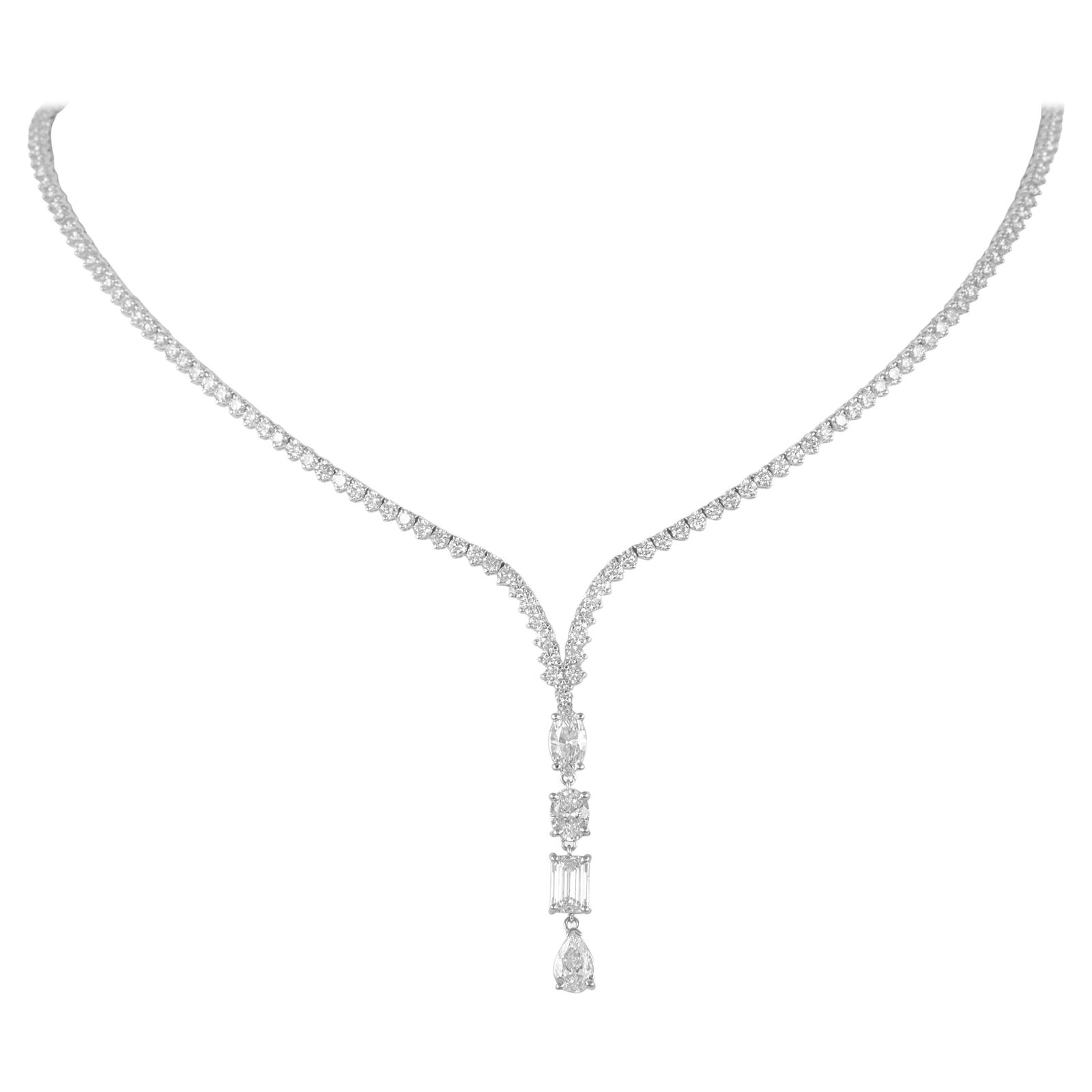 8.64ct Diamond Tennis Necklace 18k White Gold: 8.64ct Diamond Tennis Necklace 18k White Gold Discover the elegance of this stunning 8.64ct Diamond Drop Tennis Necklace crafted from 18k white gold. This exquisite piece features a contemporary desig