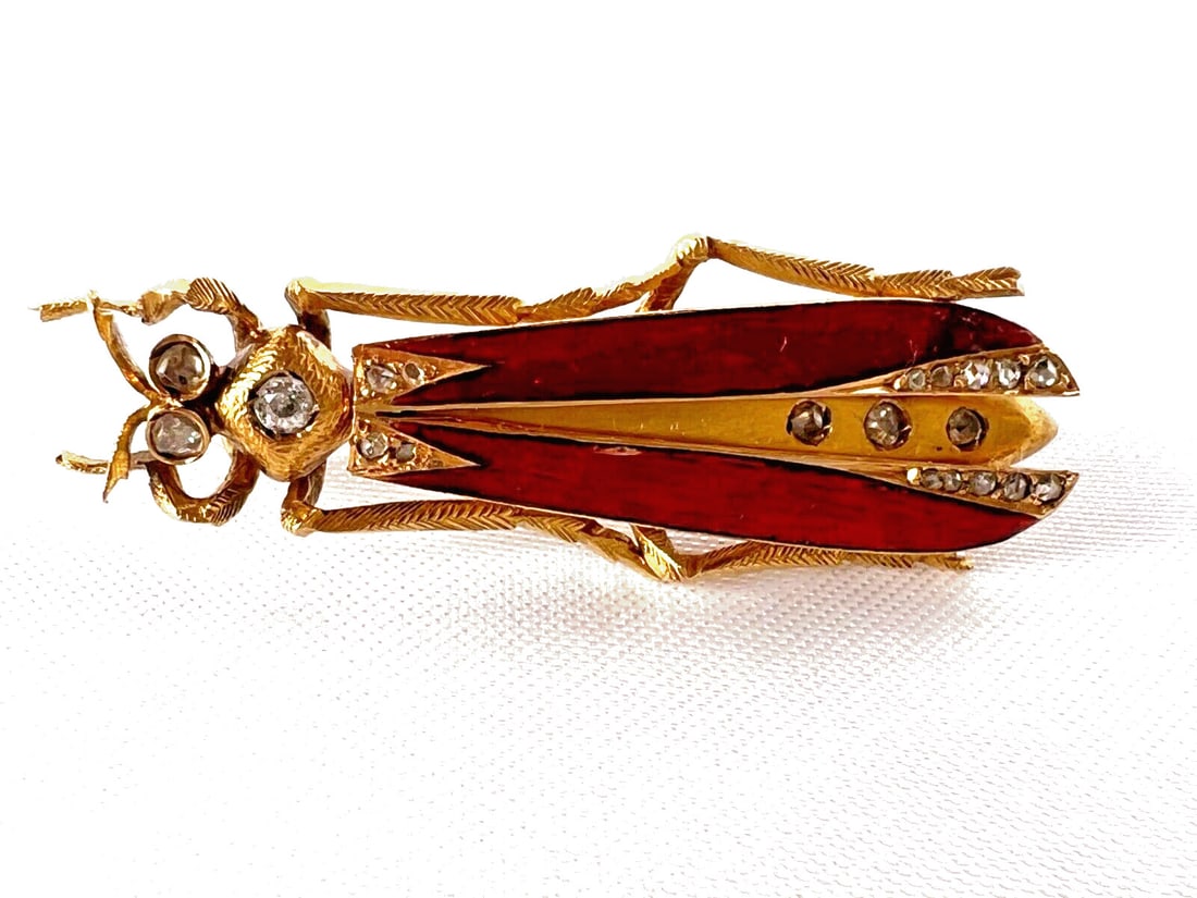 French 18K Gold Diamond Bug Brooch Vintage Design: French 18K Gold Diamond Bug Brooch Vintage Design This exquisite French brooch features a stunning design of a bug crafted from 18K enameled yellow gold, embellished with diamonds. With intricate deta