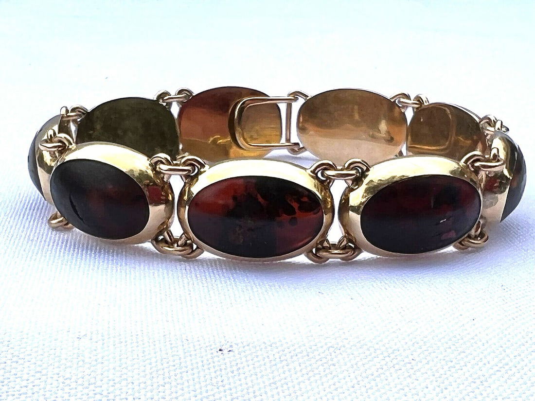 Vintage 1960's Willy Jagert 14K Gold Amber Bracelet: Vintage 1960's Willy Jagert 14K Gold Amber Bracelet Discover a stunning 1960's Danish bracelet designed by Willy Jagert for Halberstadt, crafted from 14K yellow gold. This classic piece features exqui