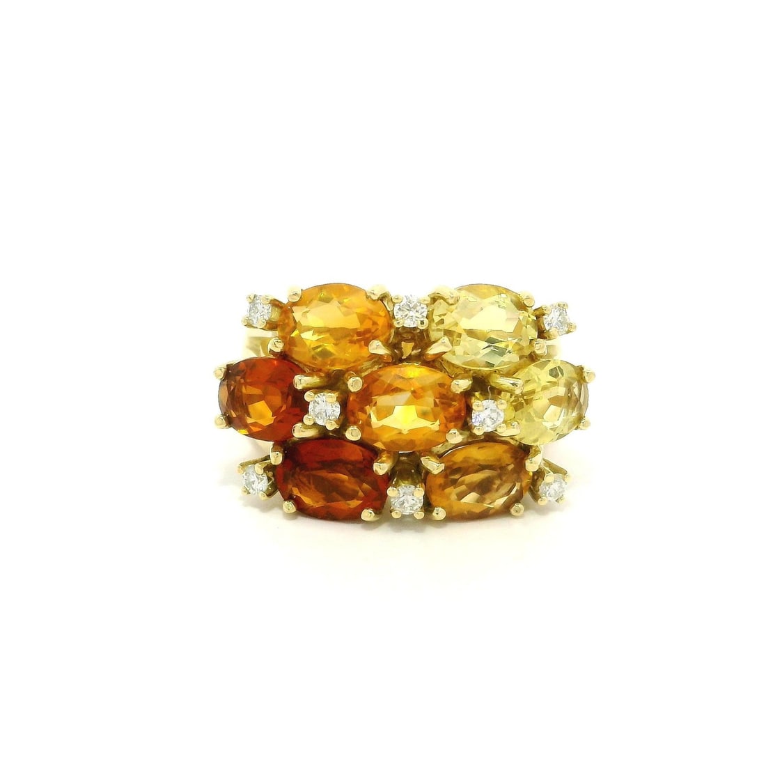 18k Yellow Gold Oval Citrine Diamond Cocktail Ring: 18k Yellow Gold Oval Citrine Diamond Cocktail Ring This exquisite cocktail ring showcases a stunning array of natural genuine citrine and quartz stones, set in solid 18k yellow gold. The focal point f