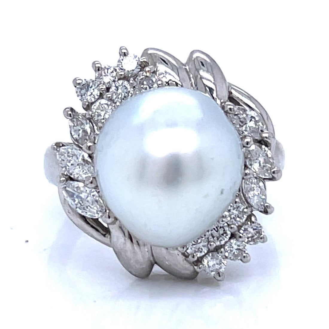 12mm South Sea Pearl and Diamond Ring in Platinum Size 6.5: 12mm South Sea Pearl and Diamond Ring in Platinum Size 6.5 This elegant ring features a 12.0mm South Sea pearl set in platinum, complemented by 18 diamonds with a total weight of 0.72 carats, showcasi