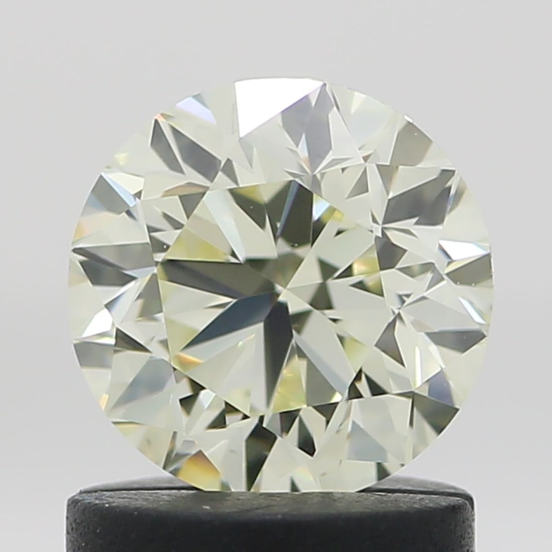Loose Diamond - ROUND 1.0ct N-O VS1: Loose Diamond - ROUND 1.0ct N-O VS1 Source: Natural Shape: ROUND Carats: 1.0 Color: N-O Certification: HRD Video: