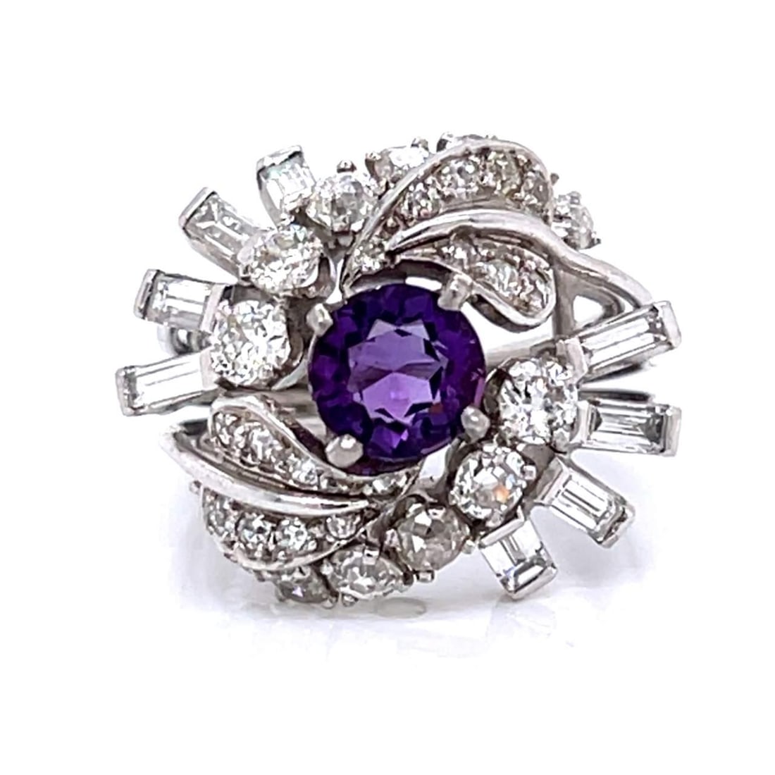 Art Deco Platinum Ring with Amethyst & Diamonds: Art Deco Platinum Ring with Amethyst & Diamonds This stunning Art Deco ring features a beautiful combination of an approximately 1.00 Ct. Amethyst, elegantly surrounded by 29 European-cut diamonds tot