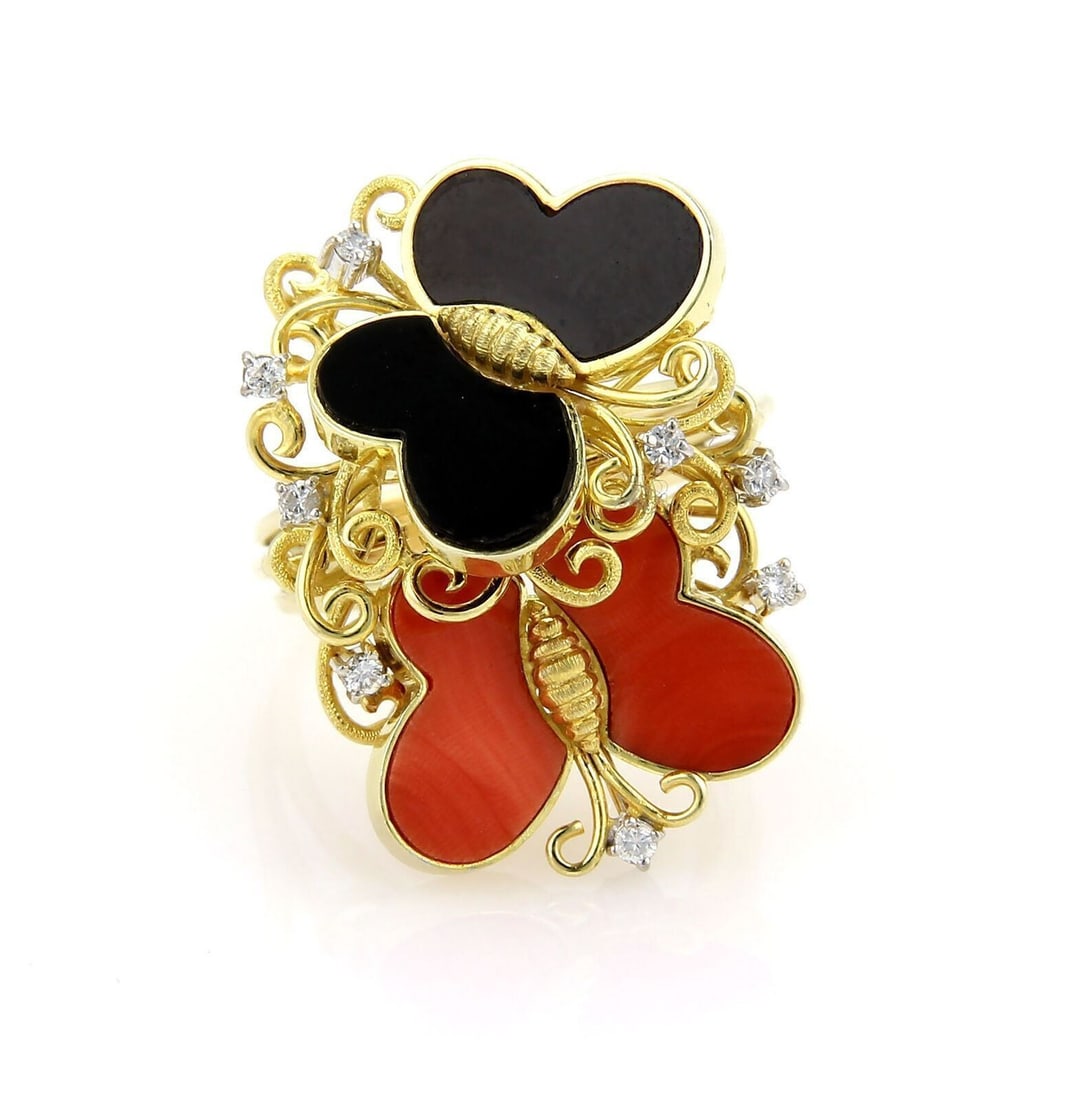Butterfly Motif 14k Yellow Gold Ring with Diamond Coral Onyx Size 11: Butterfly Motif 14k Yellow Gold Ring with Diamond Coral Onyx Size 11 This vintage butterfly ring features a striking combination of coral and onyx gemstones set in 14k yellow gold, accented by 0.20 ct