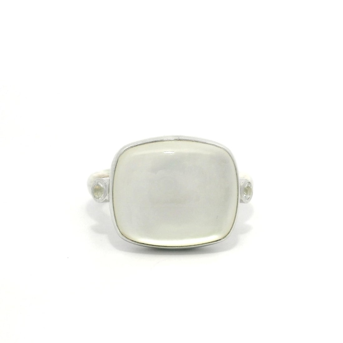 Lika Behar Sterling Silver Mother of Pearl and Clear Stones Kami Ring: Lika Behar Sterling Silver Mother of Pearl and Clear Stones Kami Ring This elegant Lika Behar ring features a stunning Mother of Pearl stone as its centerpiece, expertly cut into a cushion cabochon sh