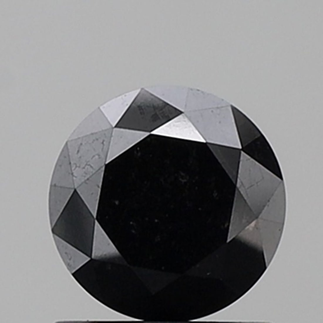 Loose Diamond - ROUND 1.22ct Fancy Black VVS2: Loose Diamond - ROUND 1.22ct Fancy Black VVS2 Source: Natural Shape: ROUND Carats: 1.22 Color: Fancy Black Certification: NONE Video: