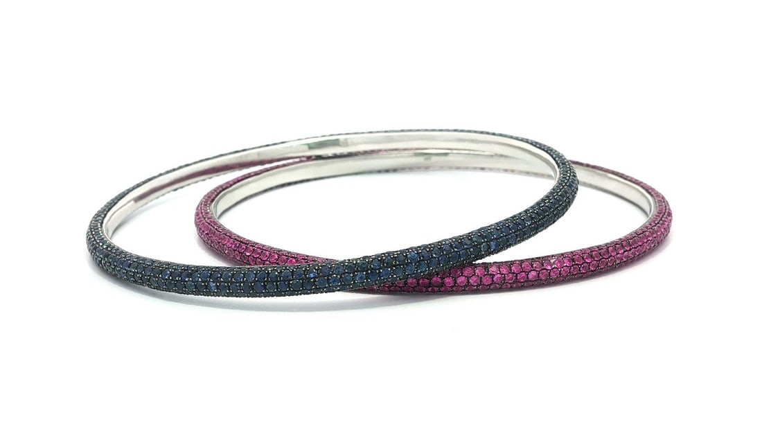 Elegant 14k White Gold Pave Sapphire Slip On Bangles Pair: Elegant 14k White Gold Pave Sapphire Slip On Bangles Pair This exquisite pair of slip-on bangle bracelets features a stunning design crafted from solid 14k white gold with black rhodium. Each bracelet