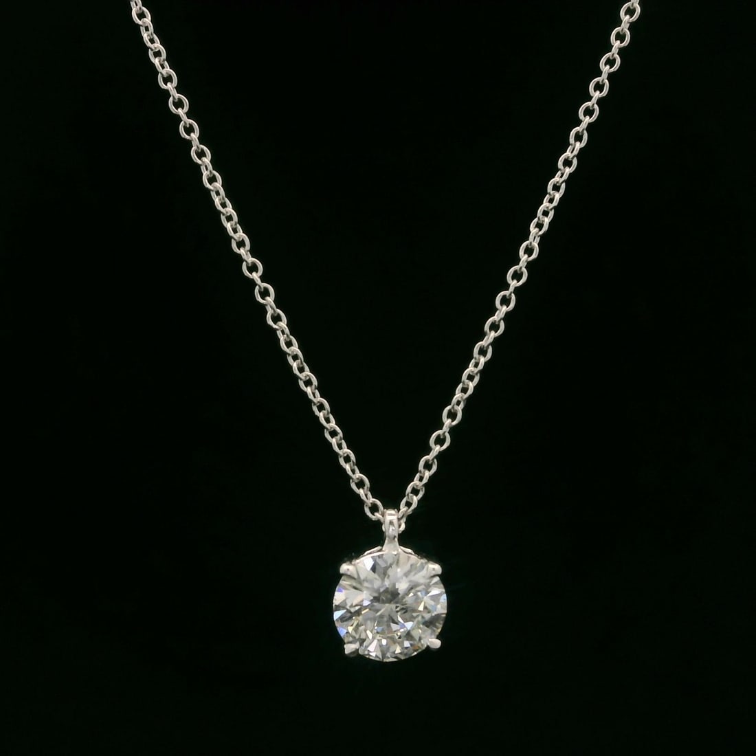 14k White Gold 0.72ct Diamond Solitaire Slide Pendant Necklace: 14k White Gold 0.72ct Diamond Solitaire Slide Pendant Necklace This exquisite pendant necklace features a stunning round brilliant cut diamond, expertly prong set in solid 14k white gold. Weighing 0.7