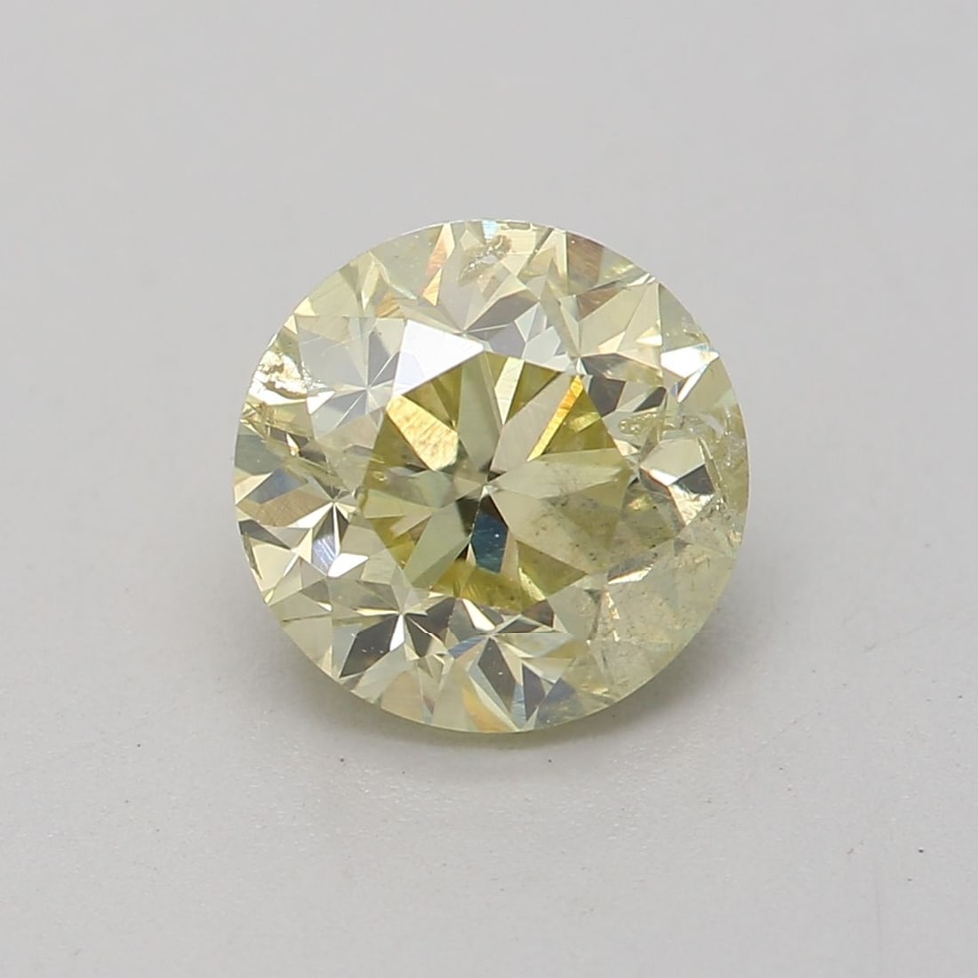 Loose Diamond - ROUND 1.01ct Fancy Light Brownish Greenish Yellow I2: Loose Diamond - ROUND 1.01ct Fancy Light Brownish Greenish Yellow I2 Source: Natural Shape: ROUND Carats: 1.01 Color: Fancy Light Brownish Greenish Yellow Certification: GIA Video: