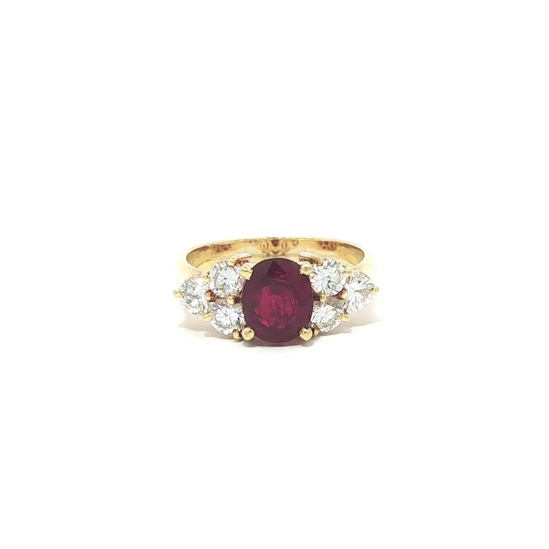 Oval Ruby and Diamond Cluster Cocktail Ring in 18k Yellow Gold with GIA Ruby: Oval Ruby and Diamond Cluster Cocktail Ring in 18k Yellow Gold with GIA Ruby This elegant cocktail ring features a natural, oval brilliant-cut ruby of deep red color, weighing approximately 1.25 carat