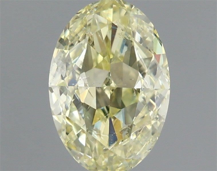 Loose Diamond - OVAL 1.01ct Fancy Light Yellow SI2: Loose Diamond - OVAL 1.01ct Fancy Light Yellow SI2 Source: Natural Shape: OVAL Carats: 1.01 Color: Fancy Light Yellow Certification: GIA Video: