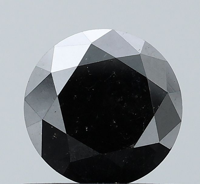 Loose Diamond - ROUND 0.91ct Fancy Black VVS2: Loose Diamond - ROUND 0.91ct Fancy Black VVS2 Source: Natural Shape: ROUND Carats: 0.91 Color: Fancy Black Certification: NONE Video: