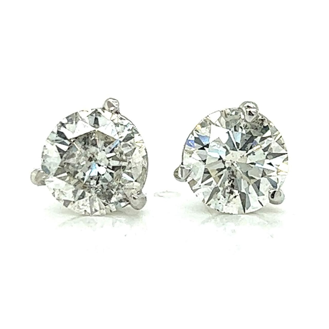 14K White Gold Diamond Stud Earrings 3.20 Ct I-J I1-I2: 14K White Gold Diamond Stud Earrings 3.20 Ct I-J I1-I2 These exquisite 14K White Gold Diamond Stud Earrings showcase a stunning total carat weight of approximately 3.20 Ct. Each earring is set with tw