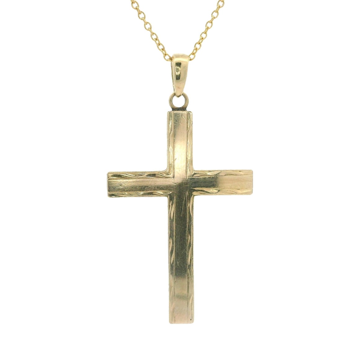 Vintage 14k Yellow Gold Engraved Cross Pendant with 18 Inch Chain: Vintage 14k Yellow Gold Engraved Cross Pendant with 18 Inch Chain This vintage 14k yellow gold engraved cross pendant is elegantly displayed on an 18-inch chain necklace. Crafted from high-quality 14