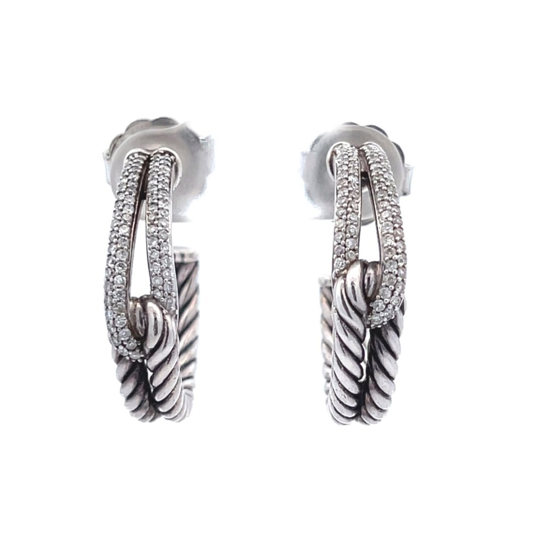 David Yurman Sterling Silver Diamond Hoop Earrings Interlaced Cable Design: David Yurman Sterling Silver Diamond Hoop Earrings Interlaced Cable Design These stunning David Yurman hoop earrings feature a unique interlaced loop cable design, crafted from sterling silver and ado