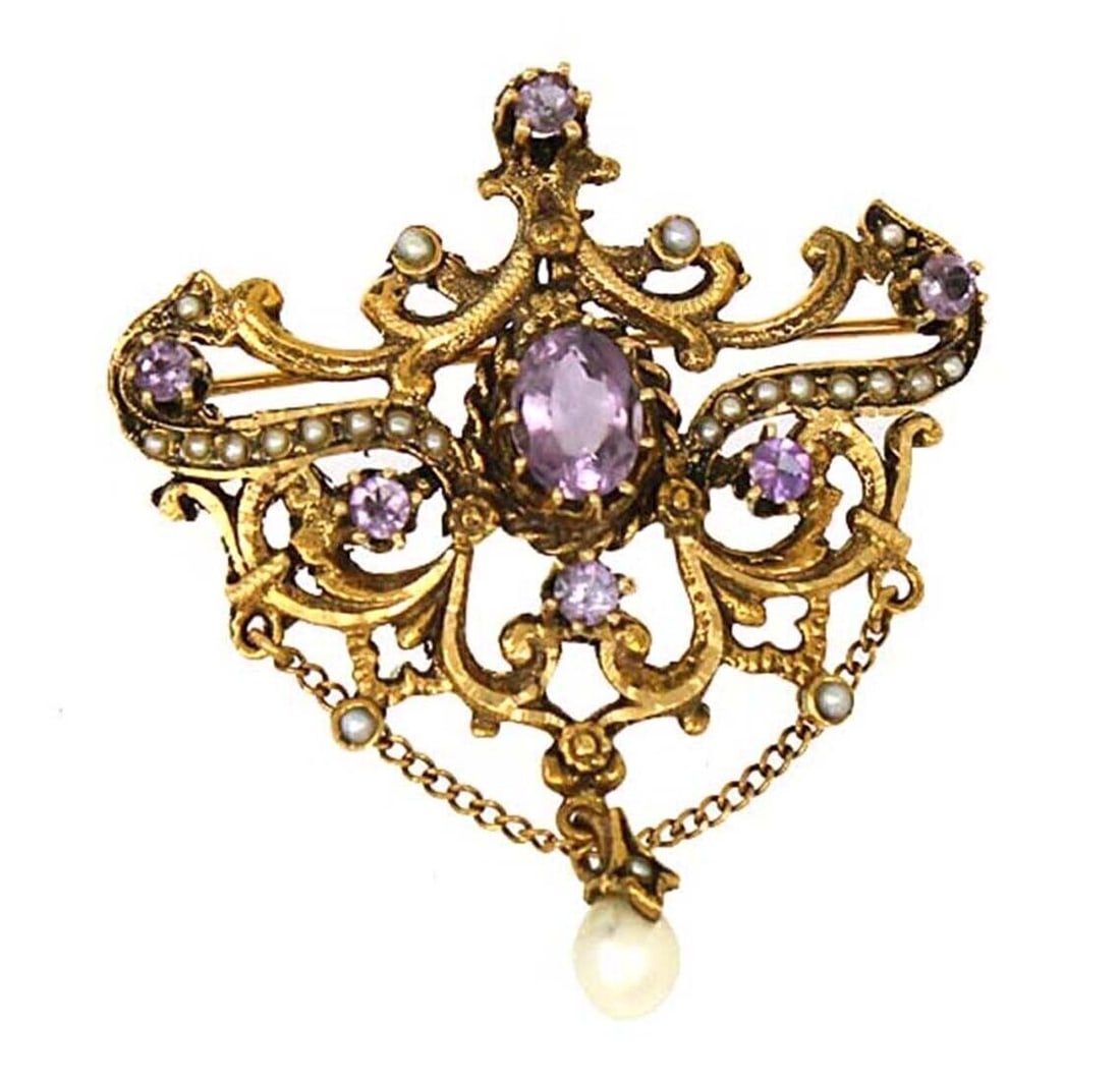 Vintage 14k Gold Pendant Brooch with Amethyst and Seed Pearls: Vintage 14k Gold Pendant Brooch with Amethyst and Seed Pearls This vintage pendant pin brooch features a sophisticated design crafted from 14k gold, showcasing a striking amethyst gemstone and an arra