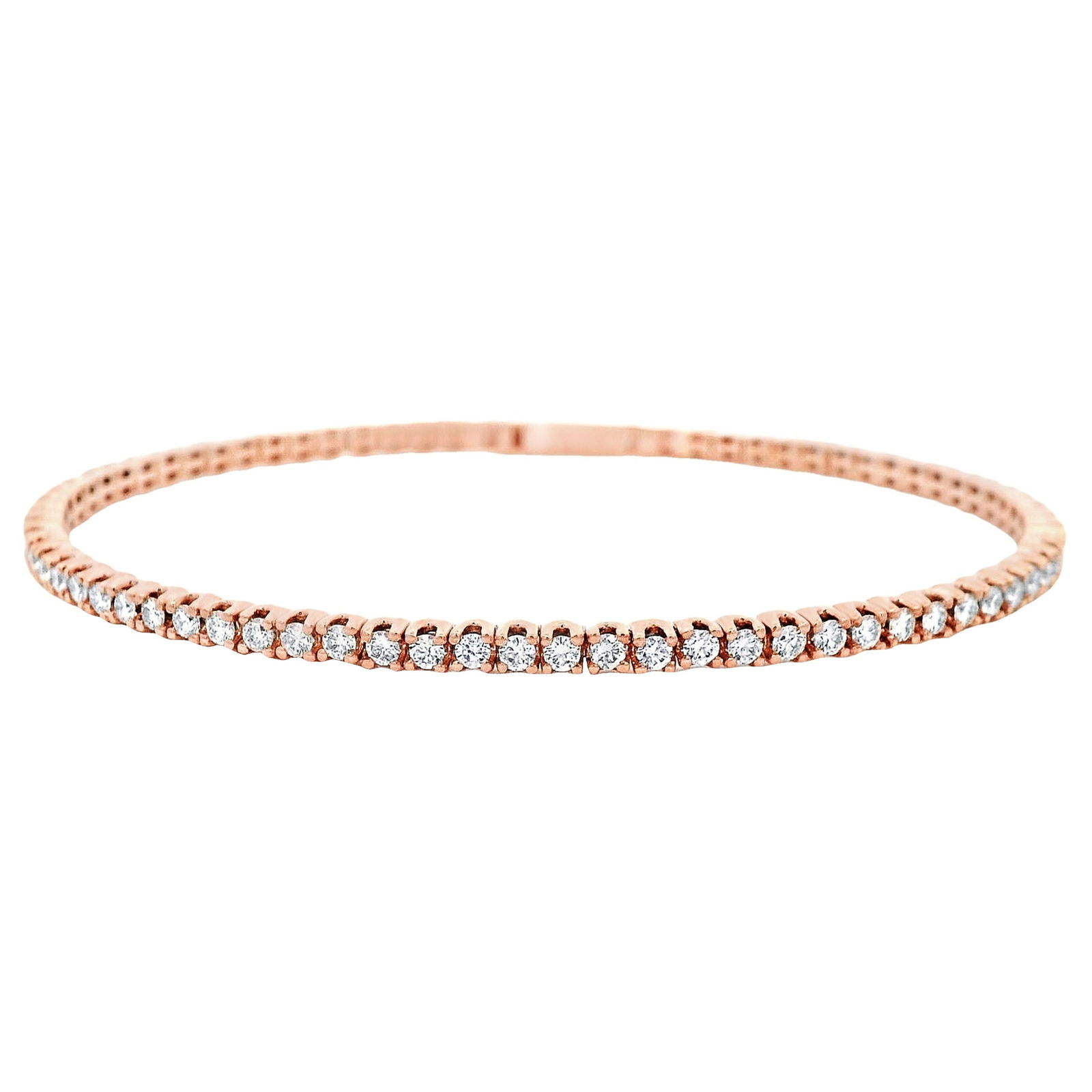 1.87ct Diamond Tennis Bangle Bracelet in 14k Rose Gold: 1.87ct Diamond Tennis Bangle Bracelet in 14k Rose Gold This exquisite contemporary flexible tennis bangle bracelet features 71 round cut diamonds totaling 1.87 carats, showcasing approximately E/F col
