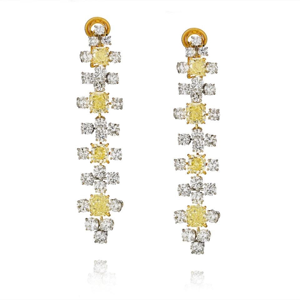 Platinum 18K Yellow Gold Fancy Yellow Diamond Drop Earrings 14.76 Cts: Platinum 18K Yellow Gold Fancy Yellow Diamond Drop Earrings 14.76 Cts These stunning earrings feature a captivating design crafted from a combination of platinum and 18K yellow gold. Each earring show