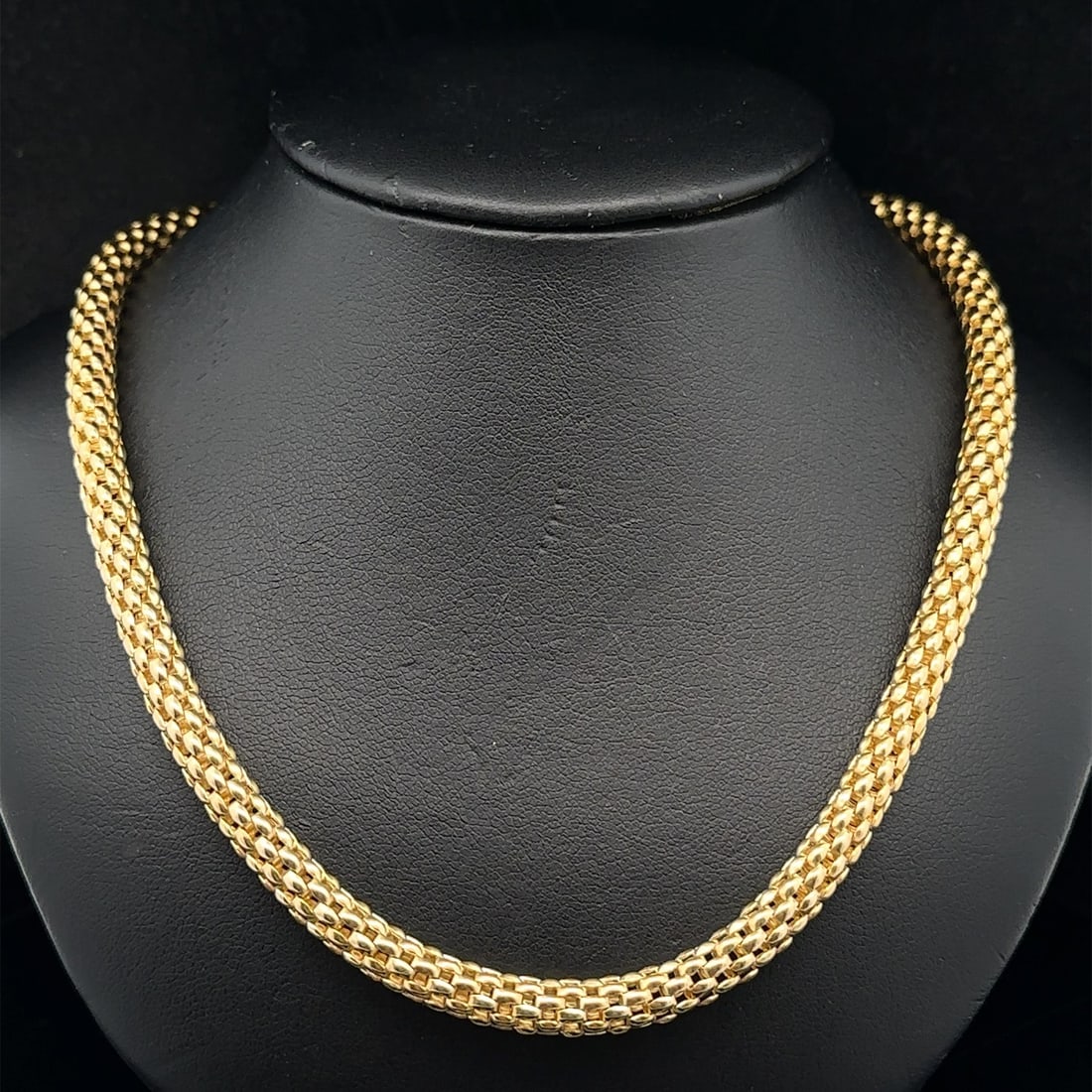 Solid 14k Yellow Gold 16 Inch German Popcorn Chain Necklace 5.5mm: Solid 14k Yellow Gold 16 Inch German Popcorn Chain Necklace 5.5mm This 16-inch necklace is crafted from solid 14k yellow gold and features a rounded popcorn tube chain design with a width of approxima