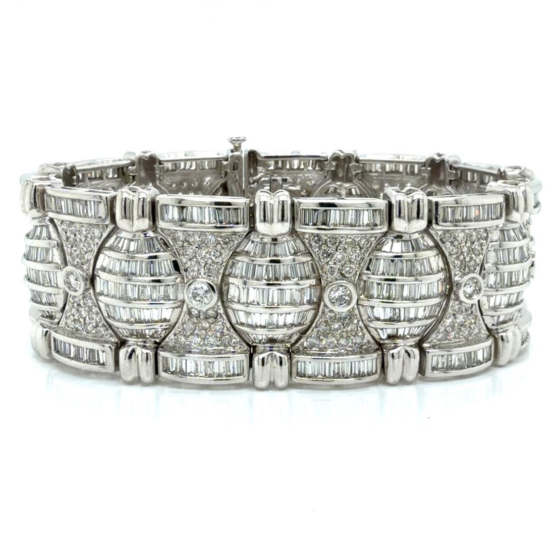 Diamond Bracelet in 18K White Gold with 23.00 Carats of Baguette and Round Stones: Diamond Bracelet in 18K White Gold with 23.00 Carats of Baguette and Round Stones This exquisite bracelet is crafted from 18K white gold and features a total of approximately 23.00 carats of diamonds.