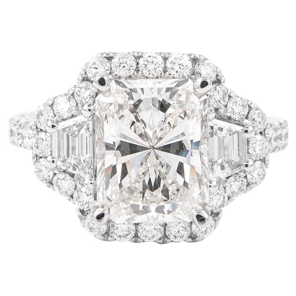 3ct GIA Radiant Cut Diamond Three Stone Ring in 18k White Gold: 3ct GIA Radiant Cut Diamond Three Stone Ring in 18k White Gold This exquisite three-stone engagement ring features a stunning GIA certified 3.00 ct radiant cut diamond, graded H for color and SI1 for
