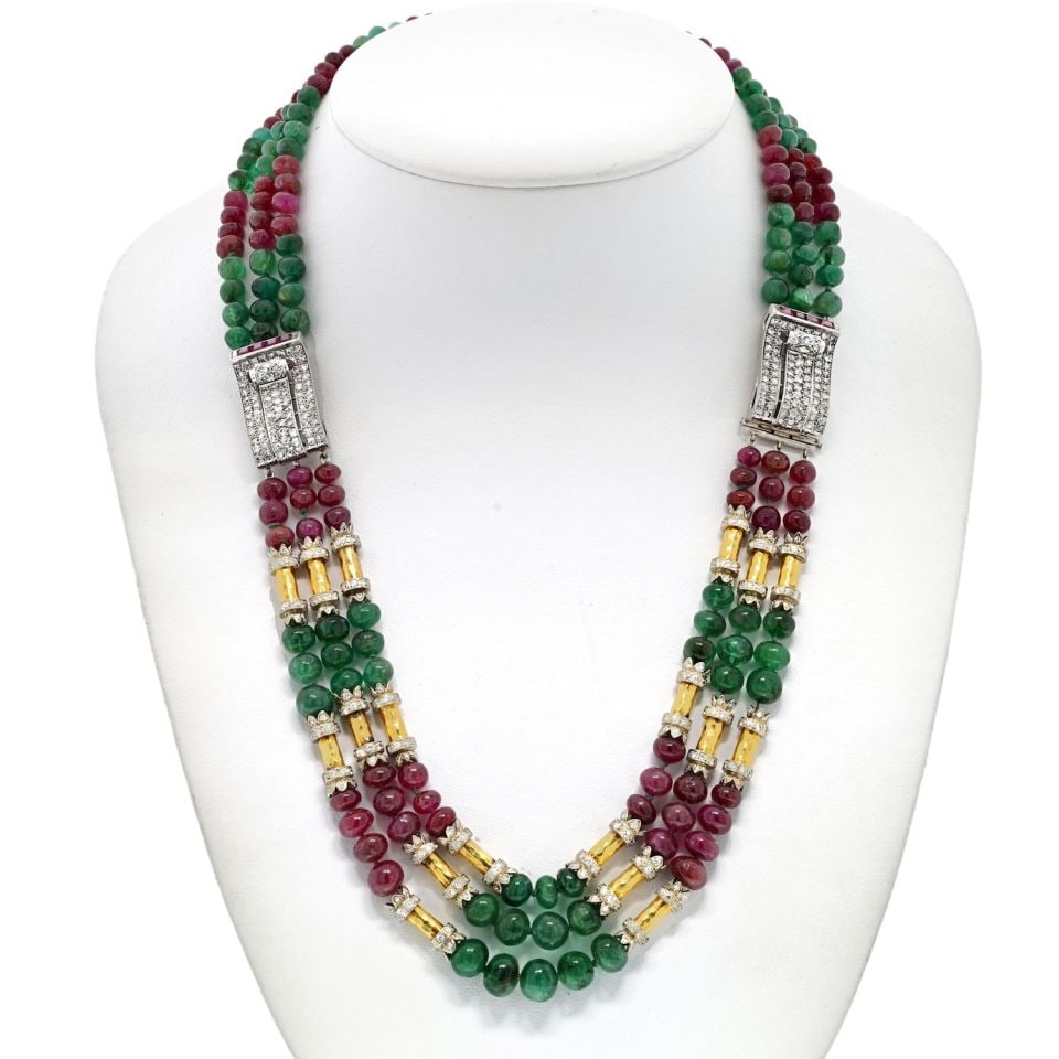 David Webb Multicolor Necklace Platinum 18K Gold Ruby Emerald Beads: David Webb Multicolor Necklace Platinum 18K Gold Ruby Emerald Beads This stunning David Webb necklace showcases a luxurious combination of platinum and 18K yellow gold. Weighing 149.3 grams, it is in