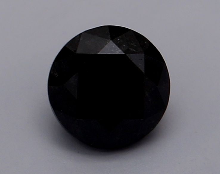 Loose Diamond - ROUND 0.61ct Fancy Black VVS2: Loose Diamond - ROUND 0.61ct Fancy Black VVS2 Source: Natural Shape: ROUND Carats: 0.61 Color: Fancy Black Certification: GIA Video: