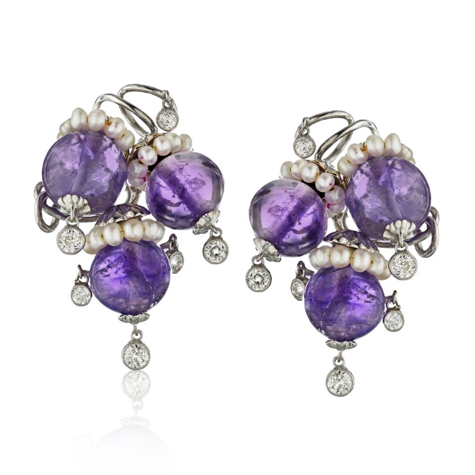 Vintage Seaman Schepps 14K White Gold Amethyst Diamond Earrings 1950s: Vintage Seaman Schepps 14K White Gold Amethyst Diamond Earrings 1950s Discover these exquisite Seaman Schepps earrings from the 1950s, crafted from luxurious 14K white gold. The earrings feature a stu