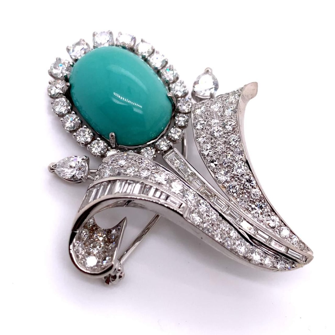 Art Deco Platinum Turquoise 18.00 Ct Diamond Flower Brooch: Art Deco Platinum Turquoise 18.00 Ct Diamond Flower Brooch This exquisite Art Deco brooch features a stunning floral design crafted in platinum, showcasing a captivating 18.00 Ct. oval cabochon turquo