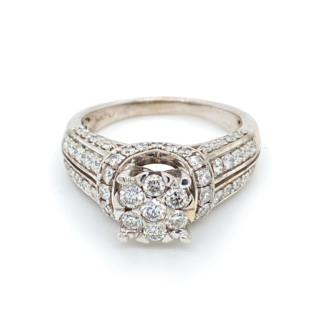 Vintage 14k White Gold Diamond Cluster Engagement Ring Size 8.75: Vintage 14k White Gold Diamond Cluster Engagement Ring Size 8.75 This vintage engagement ring features a stunning diamond cluster set in 14k white gold. The ring is designed in size 8.75 and showcases