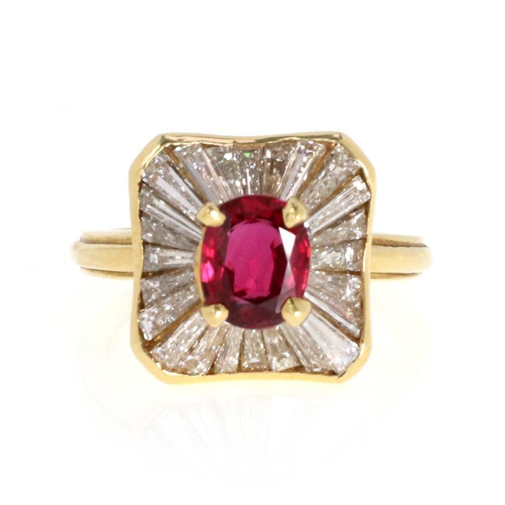 18k Yellow Gold 2.71ct Ruby and Baguette Diamond Cocktail Ring: 18k Yellow Gold 2.71ct Ruby and Baguette Diamond Cocktail Ring This stunning cocktail ring is expertly crafted from 18k yellow gold and features a captivating oval cut ruby gemstone in a secure prong