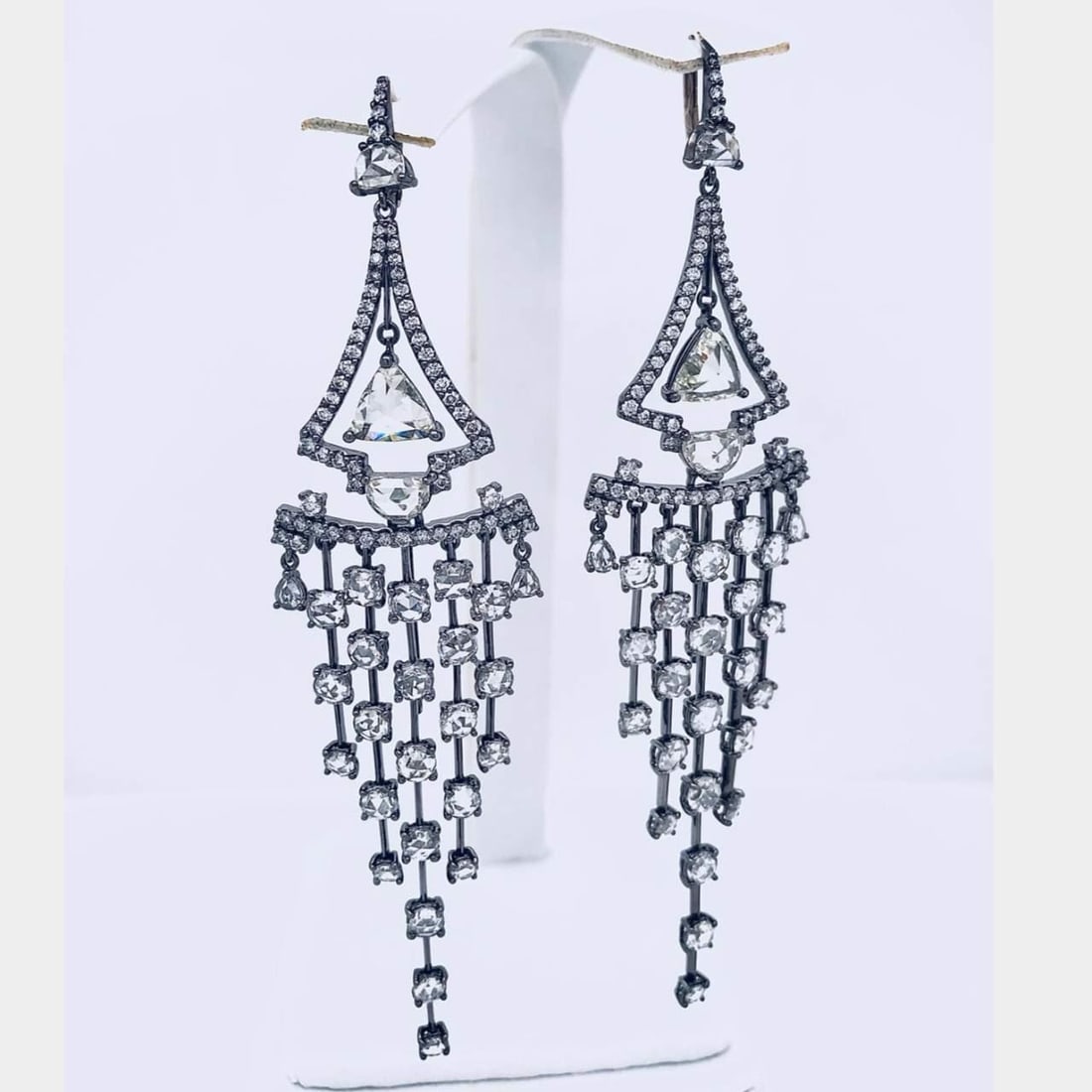 8.88 Ct Diamond Chandelier Earrings in 18K Black Rhodium Gold: 8.88 Ct Diamond Chandelier Earrings in 18K Black Rhodium Gold These stunning 8.88 Ct Diamond Chandelier Earrings are crafted in luxurious 18K Black Rhodium Gold, adding an elegant and bold touch to an