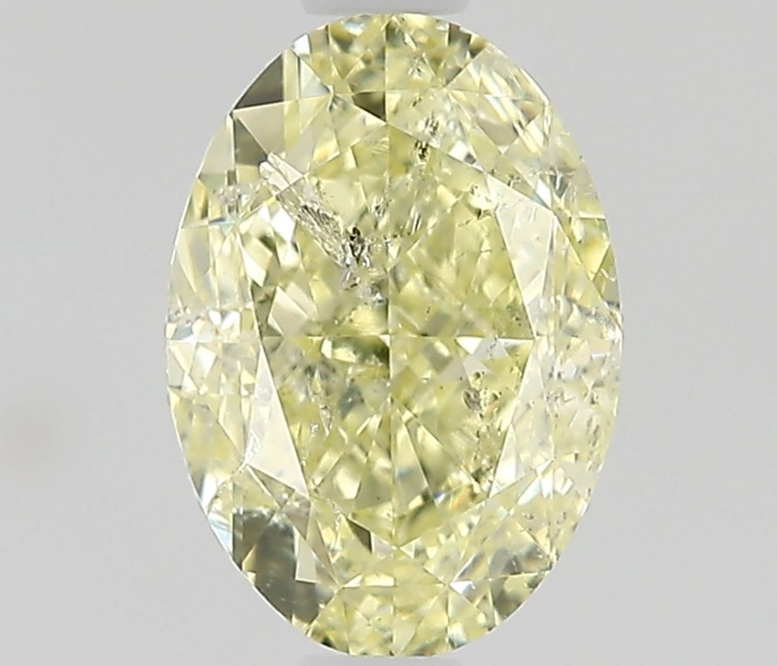 Loose Diamond - OVAL 1.0ct Fancy Light Yellow I1: Loose Diamond - OVAL 1.0ct Fancy Light Yellow I1 Source: Natural Shape: OVAL Carats: 1.0 Color: Fancy Light Yellow Certification: NONE Video: